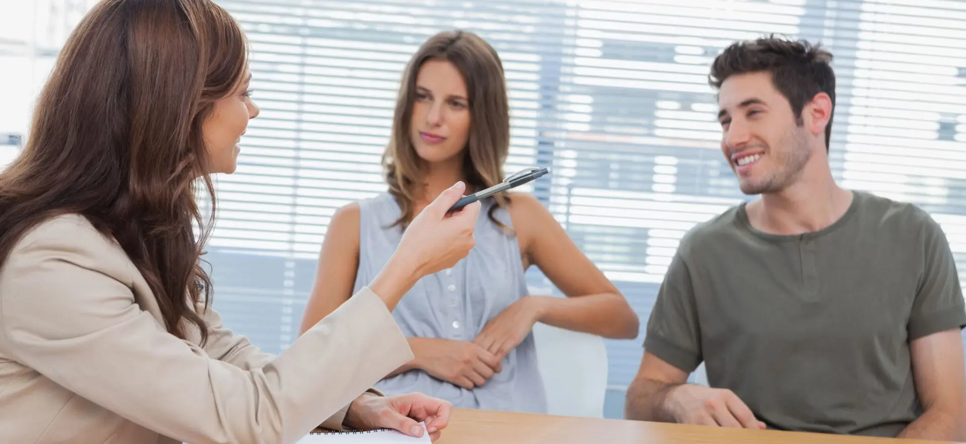 Doctor discussing with two patients